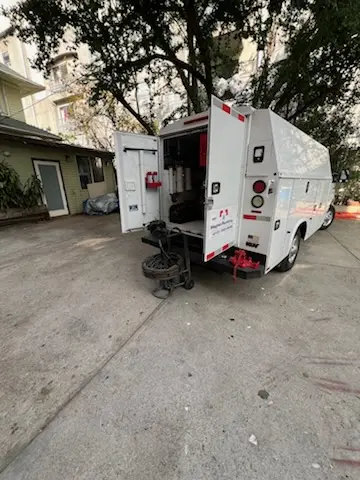 Magnet Plumbing service vehicle on-site for Grease Trap Cleaning in Georgian Heights